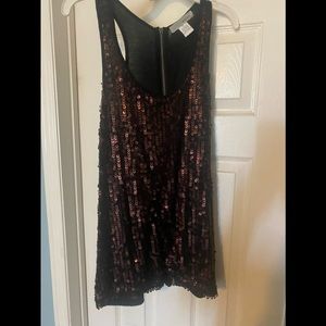 Sequinned tank
